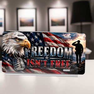 Freedom Isn’t Free license plate with bald eagle, American flag, dog tags, and a saluting soldier